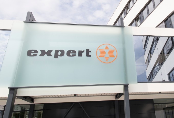 Expert International logo